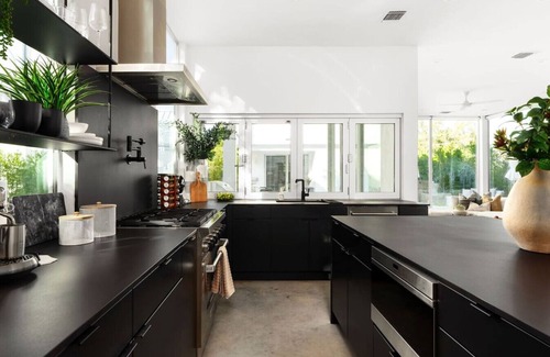 Bouldin House | ATX Compound | 15bd 10.5ba, Heated Pool, Mini Golf