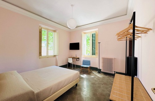 Falerone Bed & Breakfast | B&B Casa Castelli-Elegant Art Nouveau villa with garden in front of Roman theater
