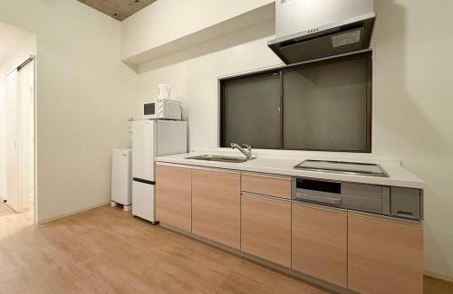 Hiroshima City Centre Apartment | b hotel NaouBLD - Central Hatchobori 2 Bedroom Apartment for 10 Guests