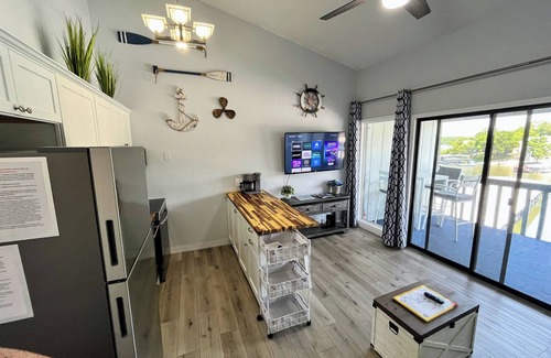 Osage Beach Condo | B Lakefront! Remolded Boat Slip Ramp, Patio Views, Sleeps 4, Pool, Kitchen WI-FI