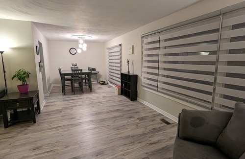 Kitchener House | Backyard Oasis with Pool, Hot tub & Fire table. 4 bedrooms, gym, & a yoga area!