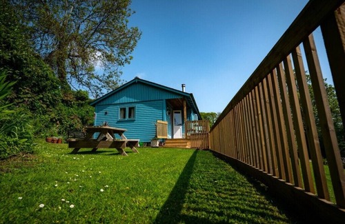 Burgh Island Cabin | Badgers Den, cosy lodge quiet countryside area near to beach in Bantham S. Devon