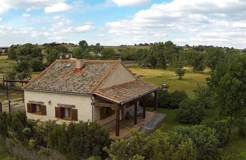 Torreiglesias Cottage | Balcony of Nut I: private garden of 500 m2, wifi, barbecue, fireplace, pets.