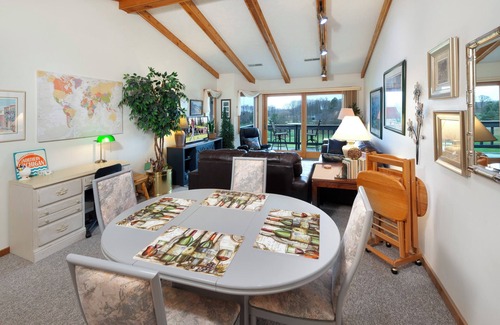Cedar Condo | Balcony with Lake Michigan and golf view