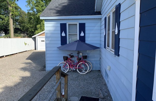 Tawas City House | Bay House Location is perfect for a stroll down Newman Street across from Public Lake Huron Beach!