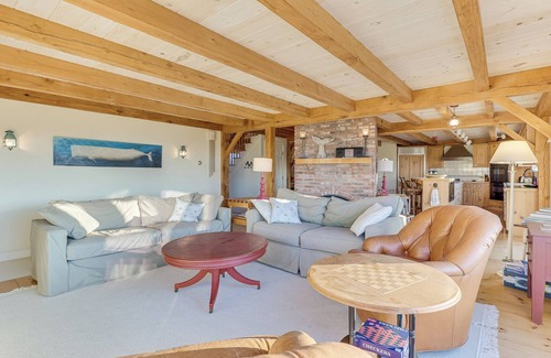 Dennis House | Bay Side with a shared private beach.