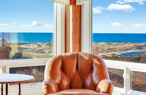 Dennis House | Bay Side with a shared private beach.