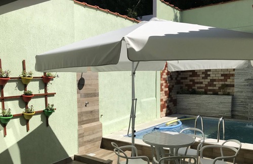 Praia Grande House | Beach and heated pool in the Diving Capital