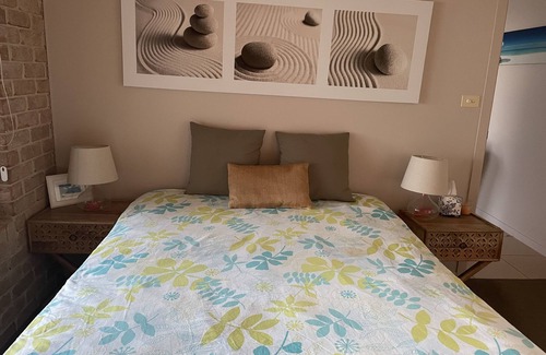Emerald Beach Bed & Breakfast | Beach and mountain view property. 2 minutes walk to the beach.