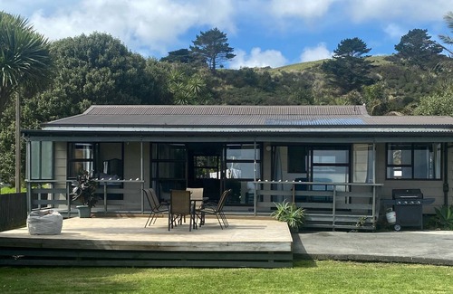 Omapere House | Beach House - Stunning Sunsets directly looking at Hokianga Bar
