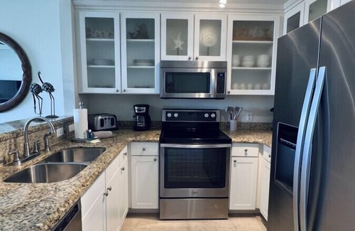 Ruskin Condo | Beach resort community! Walk to the beach, piers, pools, restaurants, fitness center & more!