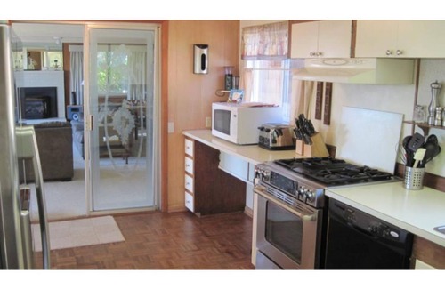 Roads End Cottage | Beach Retreat House w/Ocean Views, Covered Hot Tub, & Large Fenced Yard