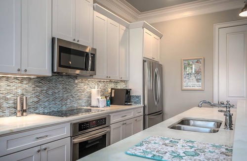 Villa Lago House | Beach, Tons of entertainment, bikes, 2 golf carts, Golf, Amazing Gym, and Marina