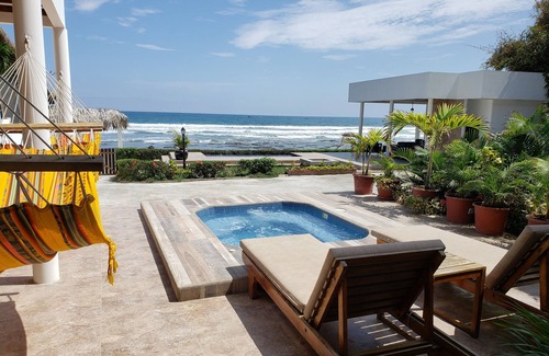 Las Nunez House | Beachfront 4 Bedrooms 4 bath House Private Direct access to the Beach.
