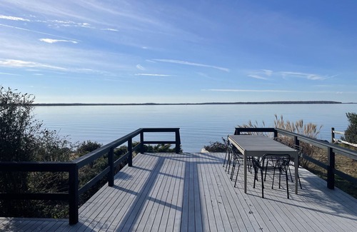 Orient House | Beachfront Heated Pool Hot Tub Orient Village Modern Dream Home