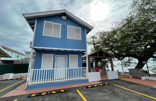 El Combate Cabin | Beachfront Rustic Cabin by Sunset Village - Blue