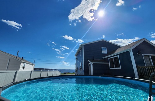 Somerset House | Beachfront w/Hot Tub, Sauna, Pool, Fire pits, Grill & Panoramic Views