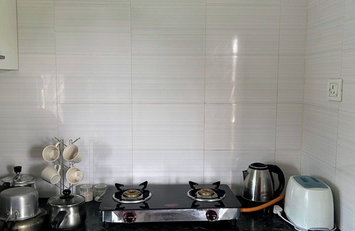 Sualkuchi Apartment | BeauMonde boutique suites - Azure Escape with AC and Wifi.