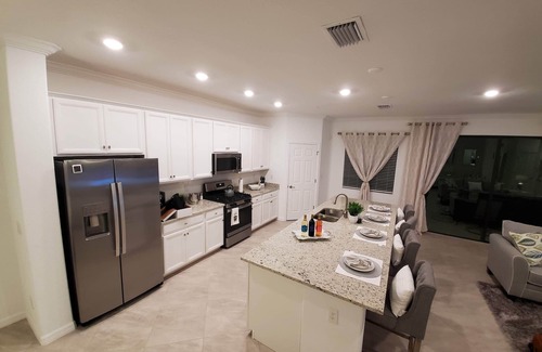 Lakewood Ranch Condo | Beautiful 2nd Floor Coach Home at Lakewood National with West Facing Lanai View