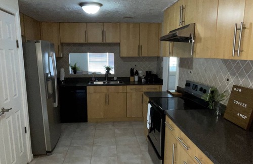 Briarforest House | Beautiful 4-bedroom home with indoor fireplace