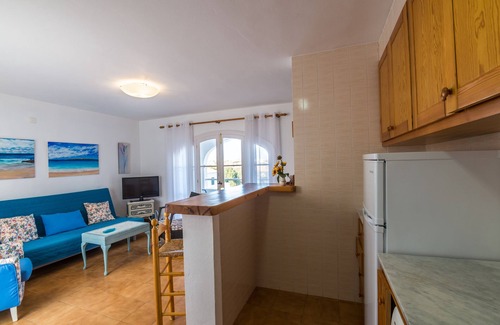 Arenal d'en Castell Apartment | Beautiful Apartment with Wi-Fi, Pool, Terrace and Sea View