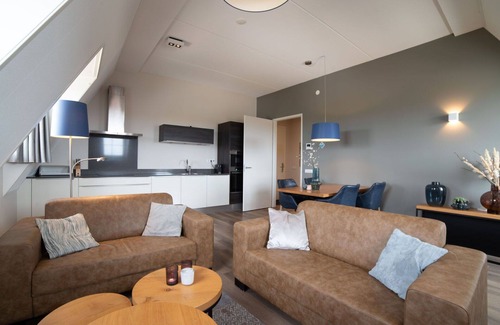 Colijnsplaat Apartment | Beautiful apartment for 4 guests with hot tub, WIFI, TV, balcony and parking