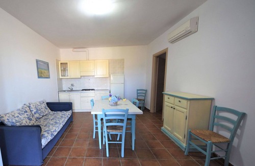 Follonica Apartment | Beautiful apartment for 6 guests with A/C, pool, TV, patio and pets allowed