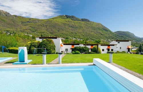 Capriasca Apartment | Beautiful apartment for 4 guests with WIFI, pool, TV, patio and panoramic view