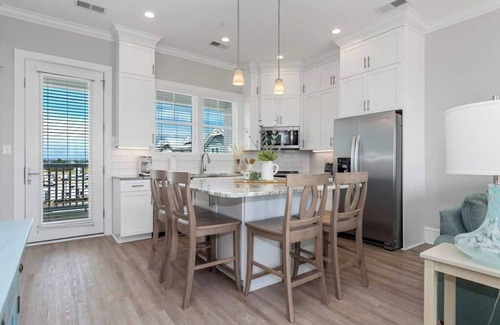 Emerald Isle Apartment | Beautiful beach views with top floor living area. Professionally decorated.
