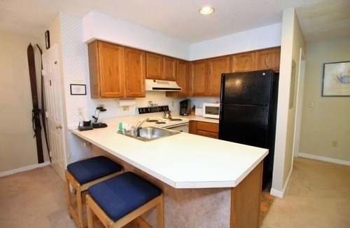 Killington Condo | Beautiful condo nestled slope side on Pico Mtn-walk to lift &ski back! 202