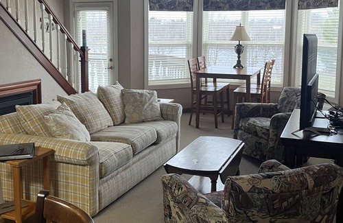 Birchwood Condo | Beautiful Condo Overlooks Red Cedar Lake and Backs onto Tagalong Golf Course