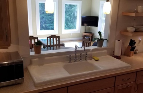 Brevard House | Beautiful Cottage with Creek, Large Grassy Yard, Easy Walk to Downtown & Parks
