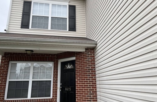 Charlotte House | Beautiful end unit vacation home for short term rental with adequate sunlight.