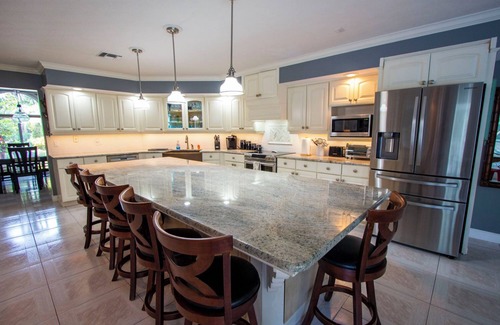 Jensen Beach House | Beautiful Large Pool Home on 1 Acre. 6 Bedrooms/4 Baths, Pet Friendly