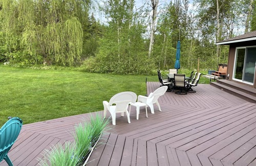 Mayfield House | Beautiful private home on the Boardman River with large yard, deck and hot tub.