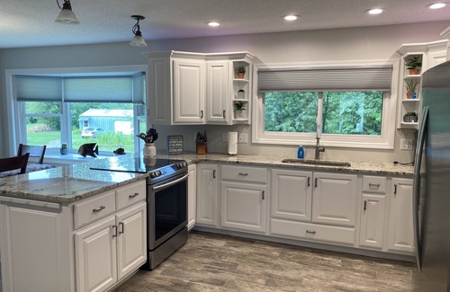 Grand Rapids House | .Beautiful, spacious lake home with level elevation to sandy beach.