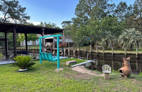 Gautier Cabin | BEAUTIFUL WATERFRONT . GNAT SCREENED BOATHOUSE AND AJOINING COVERED BOAT SLIPSn