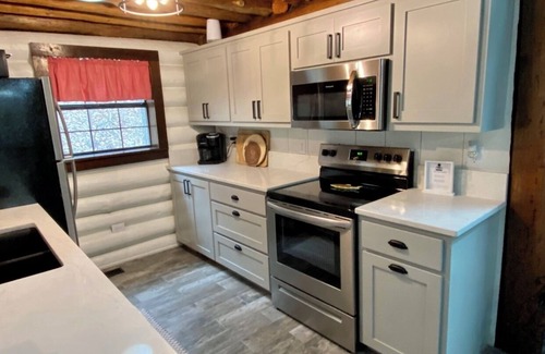 Garfield House | Beaver Lake Log Cabin, Lakefront on 6 Private Acres, 6 Person Hot Tub & Firepit