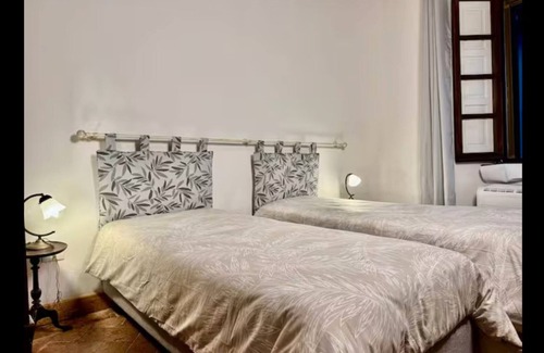 Scansano Bed & Breakfast | Bed and Breakfast 'Palazzo Ghio' with Wi-Fi and Air Conditioning