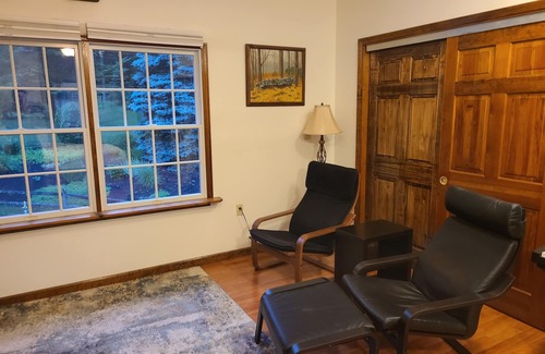 Redding Ridge Apartment | Bedroom, bathroom with beautiful shower, second room with work or eating area.