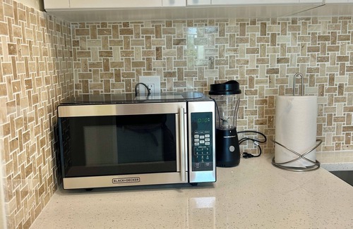 Greater Northdale Apartment | Bellagio a modern , spacious unit with a large balcony facing a golf course