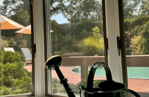 Bellport House | Bellport Bliss: Pool and Relaxing Spaces