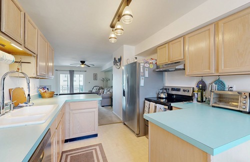 Ocean View House | Bethany Marina dog friendly bayfront townhouse w/pool, balcony, grill