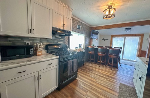 Big Bay House | Big Bay Getaway - Outdoor sauna and extra parking for snowmobiles & trailers!