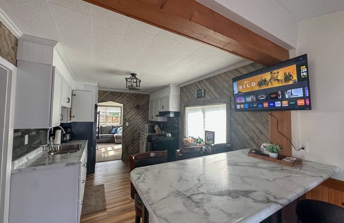 Big Bay House | Big Bay Getaway - Outdoor sauna and extra parking for snowmobiles & trailers!