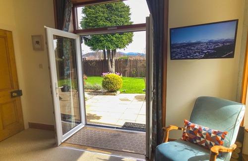 Aviemore Ski Chalet | Birchview- central Aviemore accommodation with garden.