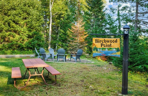Mercer Cabin | Birchwood Point on Wilson Lake, Lakeside Bliss: Charming Cottage with Screen Porch on Wilson Lake in.
