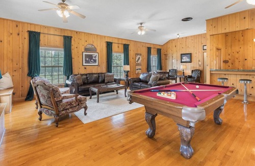 Fort Smith House | Blooming Garden with king size bed, smart tv, private bath, game room and more!