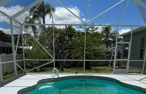 Cocoa House | Blue Wave · Blue Wave 4BD Jacuzzi & Pool Paradise w/ BBQ