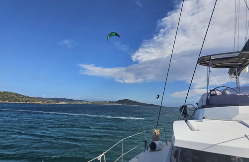 Portisco Boat Rental | Boat 'Catamarano 43 Foil E Kite Equipment' with Sea View, Wi-Fi and Air Conditioning